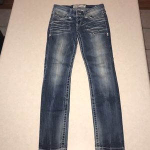Lightly worn buckle jeans